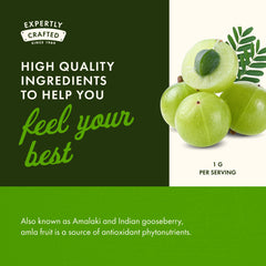 Open bottle releasing Amla Fruit capsules