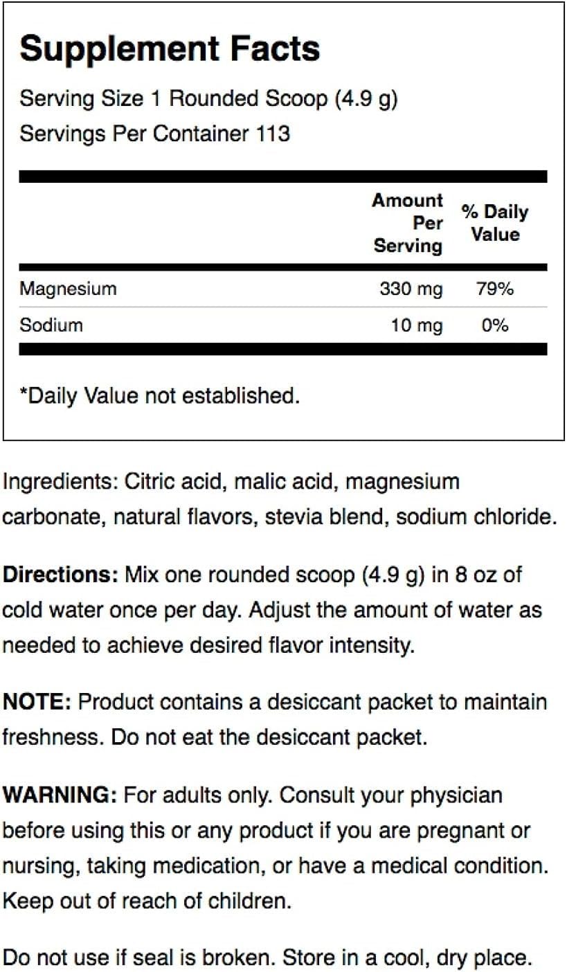 Close-up of Swanson Mellow Magnesium Drink orange powder being poured, showcasing texture
