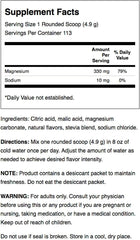Close-up of Swanson Mellow Magnesium Drink orange powder being poured, showcasing texture