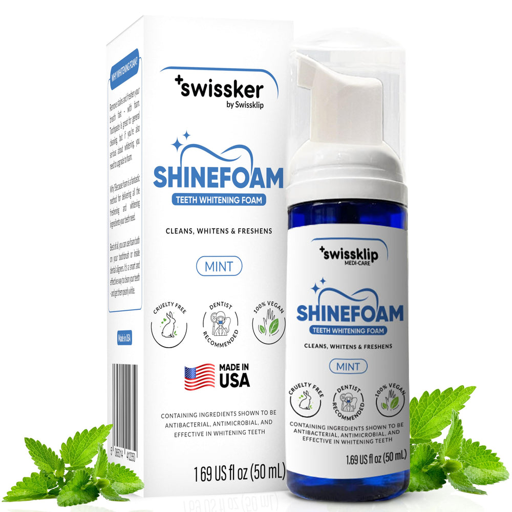 Applying Swissklip whitening foam to teeth