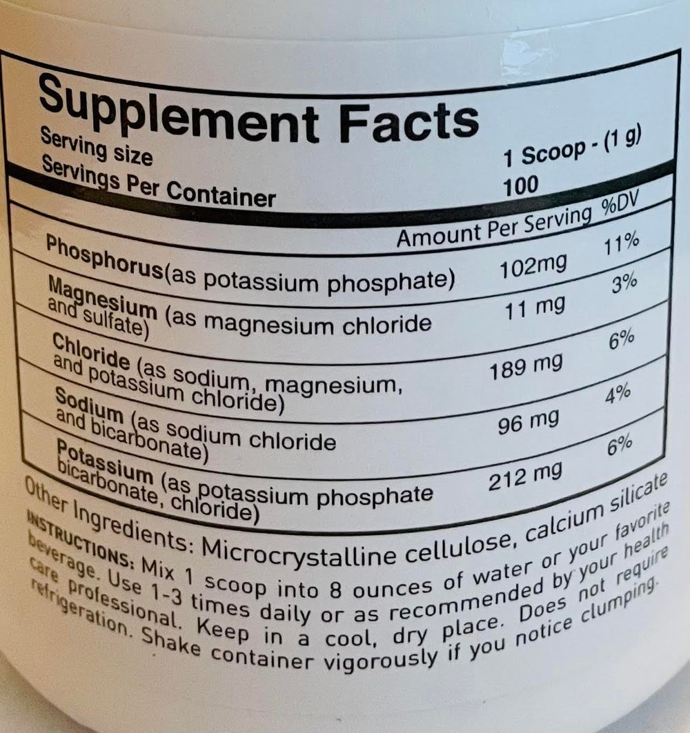 Synerplex Revive powder ready to mix on the counter.