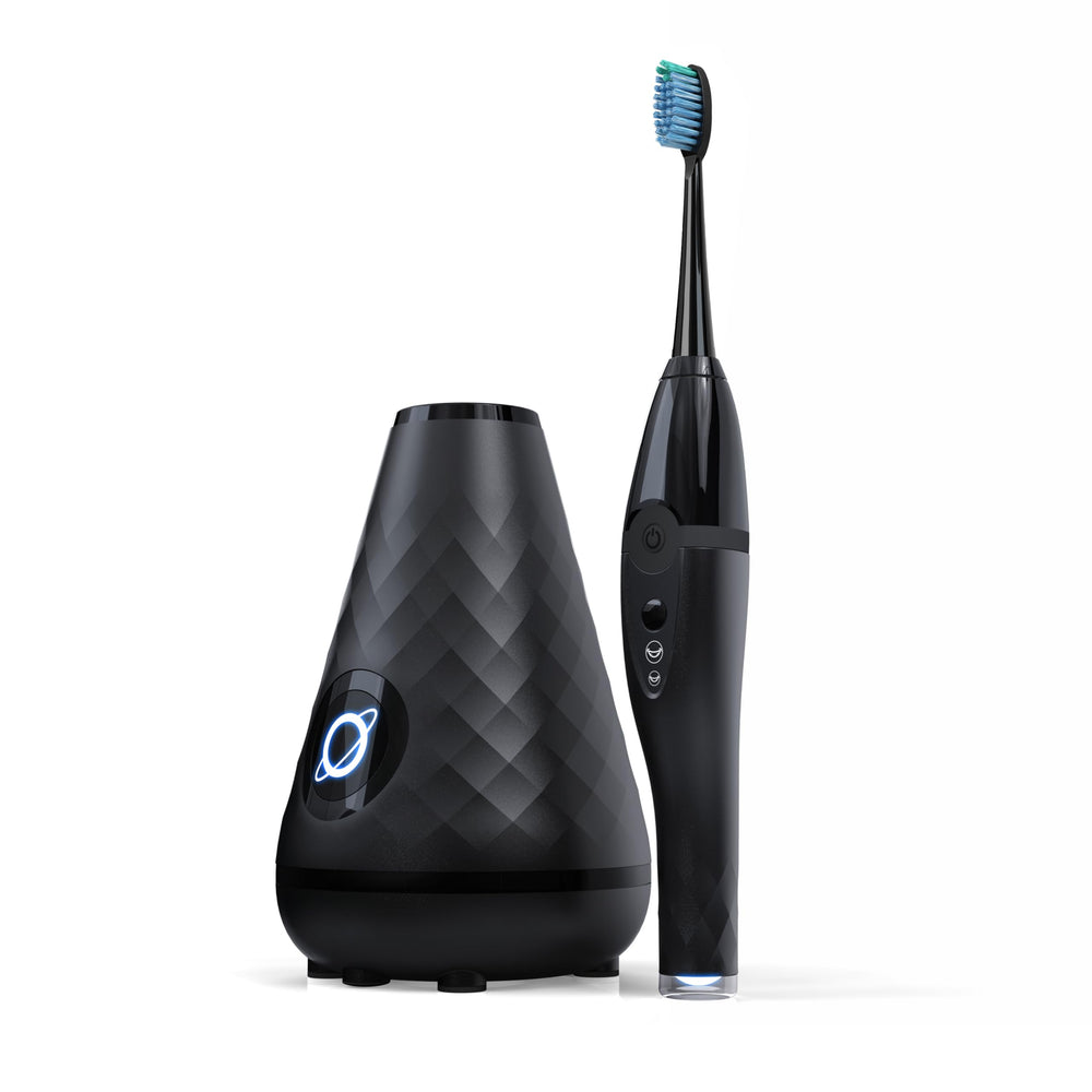TAO Clean Sonic Toothbrush in black with ergonomic handle