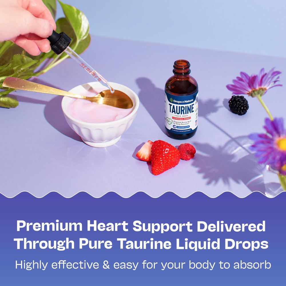 Pouring taurine drops from bottle to show liquid appearance