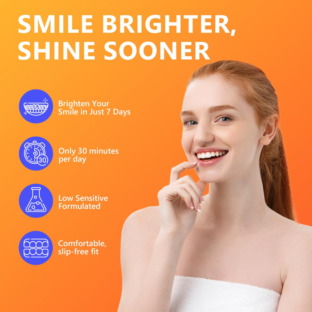 Whitening strips being applied to teeth