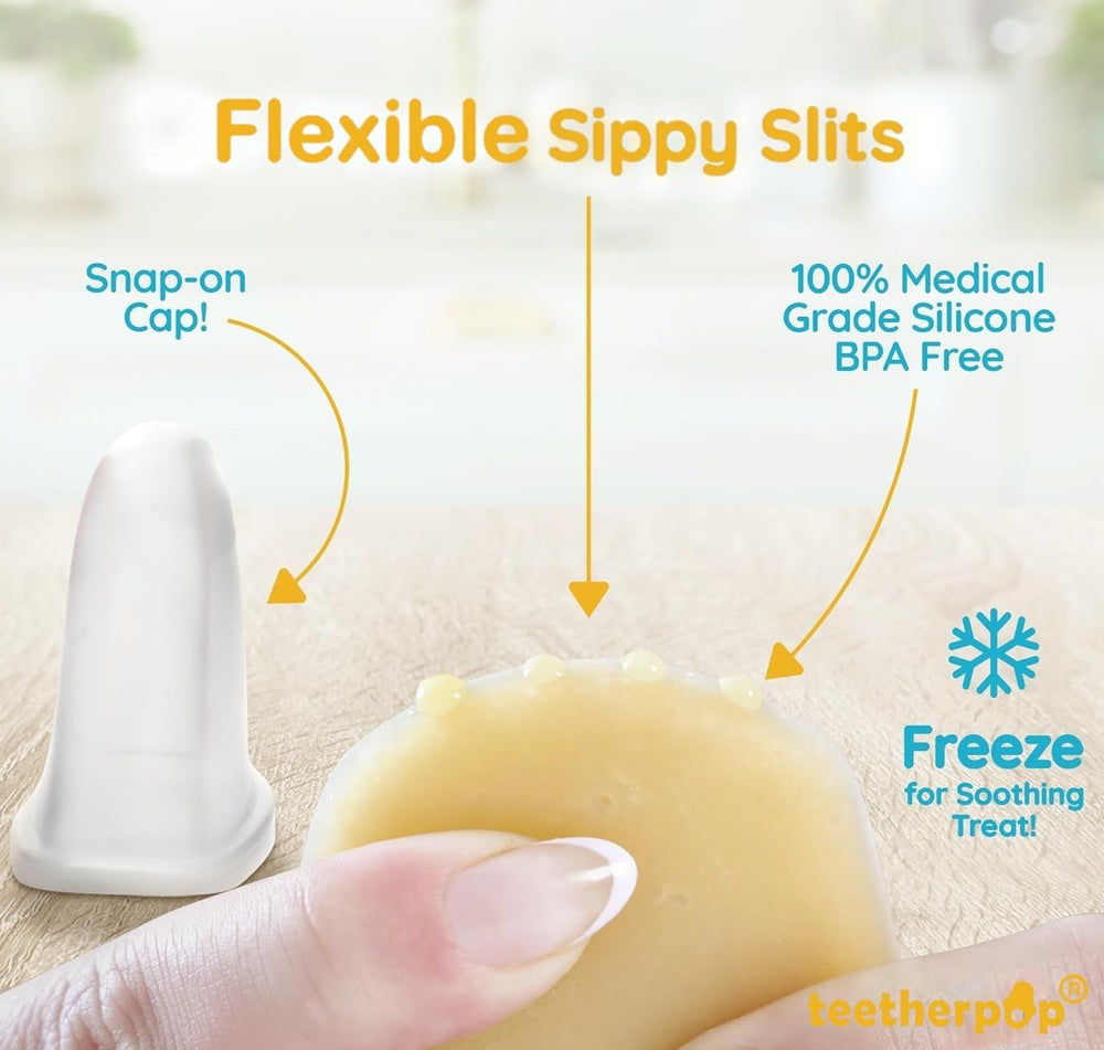 Baby being fed Teetherpop teether with puree