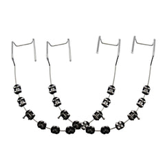 Black fake braces on a dental mold for teaching