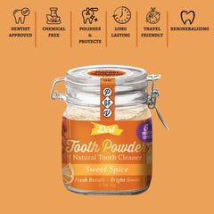Toothbrush dipping into The Dirt tooth powder