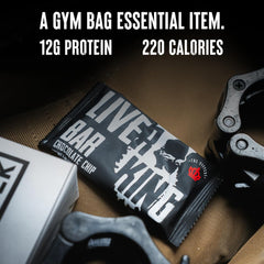 The Fittest Ever THE FITTEST Chocolate Chip Liver King Bar lying on counter emphasizing convenient gluten-free protein snack