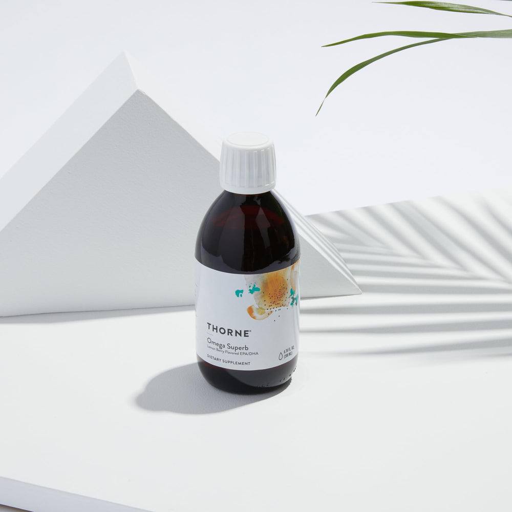 Easy dosing dropper beside the Omega Superb bottle