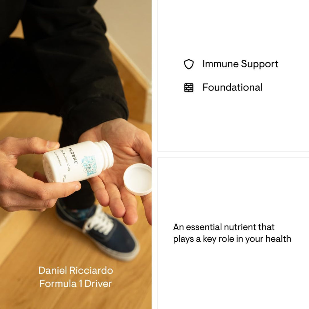 Nutritional supplement bottle in black and gold packaging