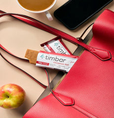 TIMBAR Protein Bars nutrition panel shows 12 g protein and 9 g fiber