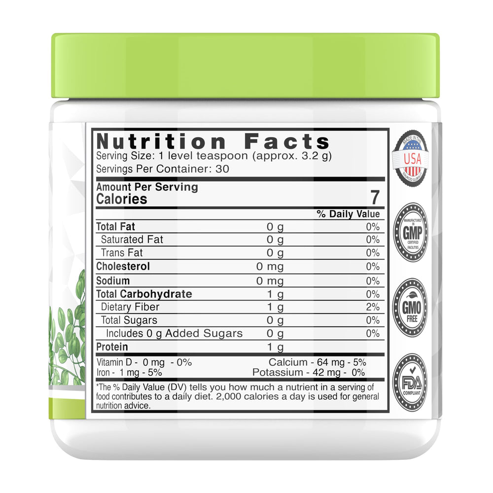 Close-up of moringa leaves and powder jars