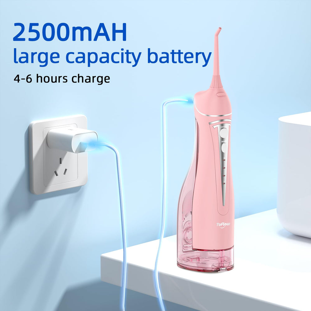 USB charging cable connected to ToFlow flosser