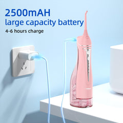 USB charging cable connected to ToFlow flosser
