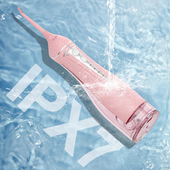 ToFlow water flosser in use at sink showing water jet