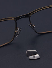 Close-up of Tolaxy metal nose pads on Oakley Tincup OX3184