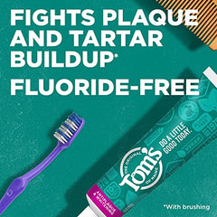 Three peppermint toothpaste tubes arranged side by side