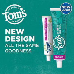 Close-up of two fluoride-free toothpaste tubes with fennel flavor packaging