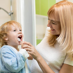 Three finger toothbrushes designed for infant oral cleaning
