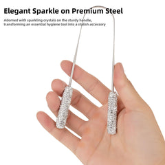 Close up of crystal embedded tongue cleaner in pink finish