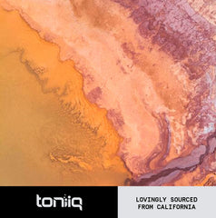 Capsules next to bottle for scale