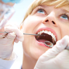 Compact, travel-ready tonsil stone removal set in use