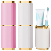 Two-piece pink and white flat cylindrical toothbrush case viewed from the side