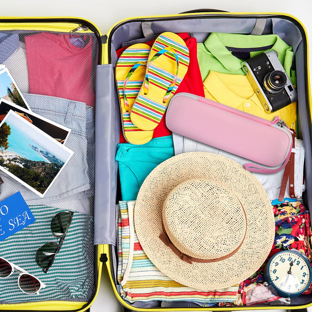 Travel-ready pink toothbrush case with organized accessories