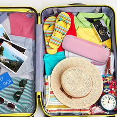 Travel-ready pink toothbrush case with organized accessories