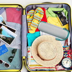 Lifestyle shot of the white travel case on a surface