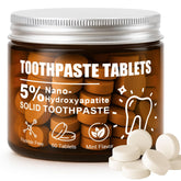 UV-protected glass bottle holding toothpaste tablets