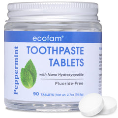 Peppermint toothpaste tablets in a reusable glass jar