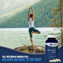 Bottle beside a glass of water to represent hydration