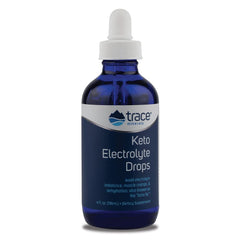 Trace Minerals Keto Electrolyte Drops bottle on a workout setup for quick hydration.