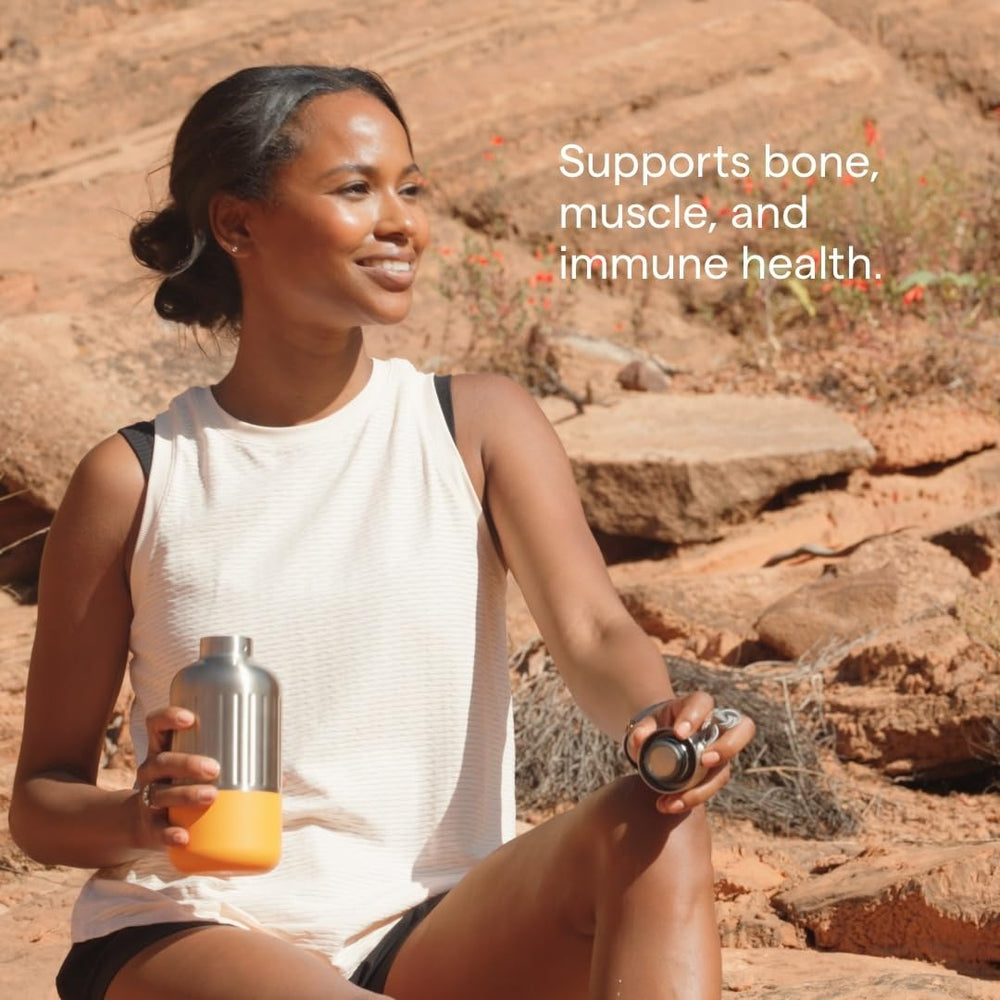 Pouring Trace Minerals Utah Sea Minerals into water for electrolyte drink