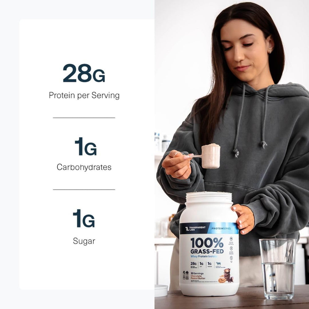 Scoop with protein powder beside the canister