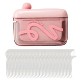 Travel floss picks in pink case with automatic pop-up dispenser
