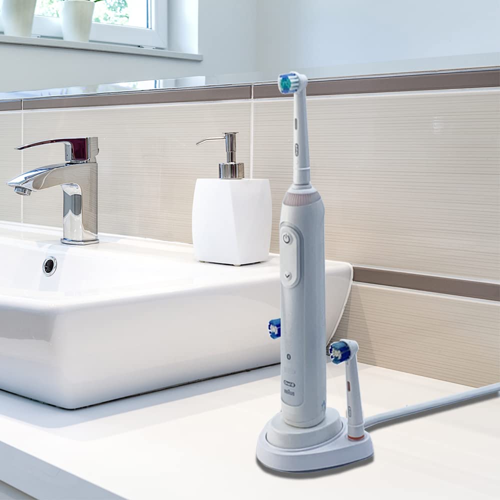 Travel-friendly portable Oral-B charger base in use