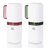 Purple and green travel toothbrush holder with rinse cup, front view