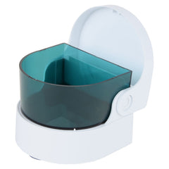 Denture cleaner powered by AA batteries with open tank