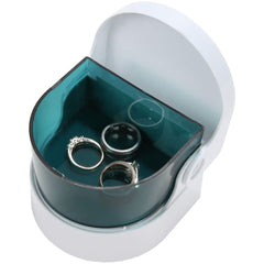 Travel-ready denture cleaner compact in a bag