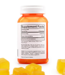 Close-up of saffron gummies showing orange citrus-flavored gummies