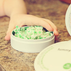 Tummy Drops gluten-free, Kosher-certified seals on packaging.