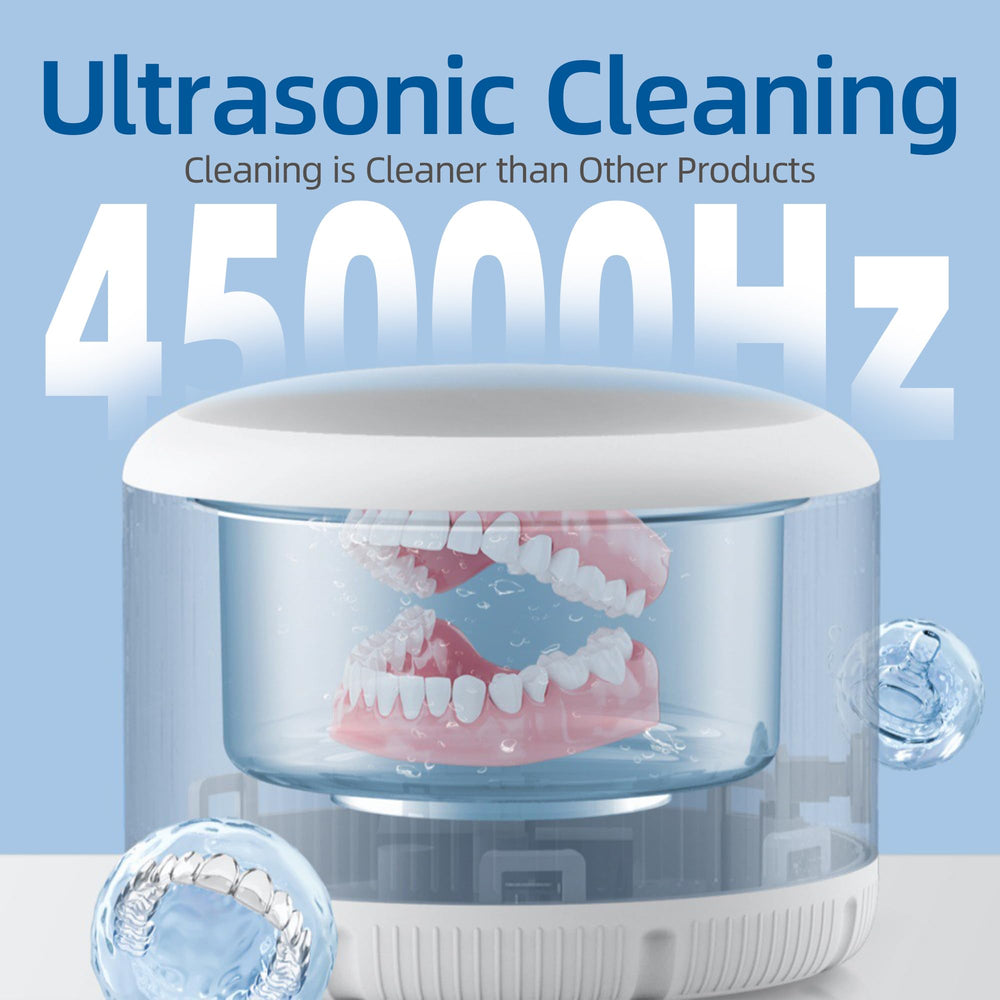 Ultrasonic cleaner includes brush and tweezers