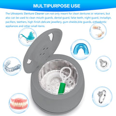 Retainer and mouth guard being cleaned by the device