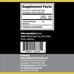 Creatine powder being poured into a shaker