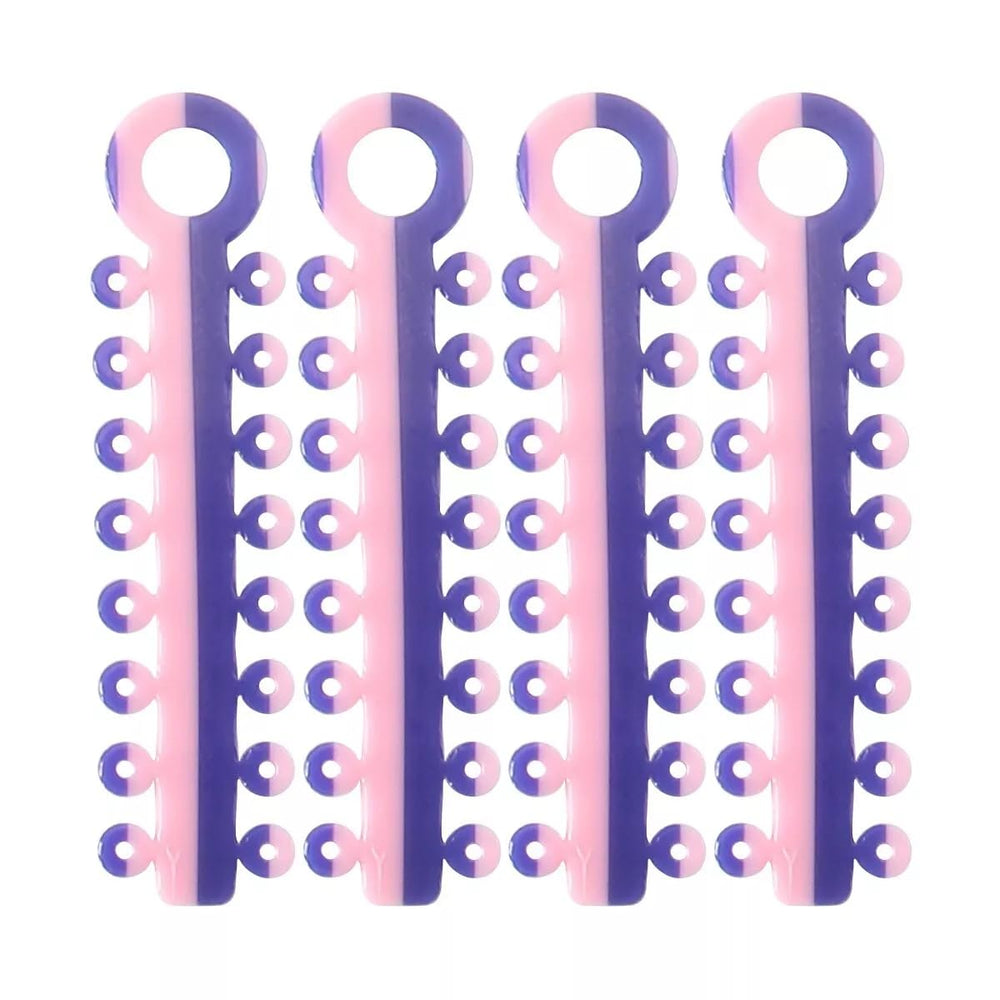 Close-up of purple and pink ligature ties