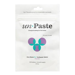 Front view of Unpaste toothpaste tablets in a resealable 250-count packet