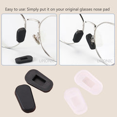 White UPIONIC nose pad covers held in hand to show lightweight design