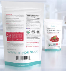 Serving scoop beside pouch of cranberry powder